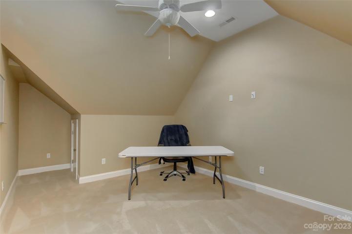 Flex space... ceiling fan w/light and attic access door.  Could be home office, work out room, craft area etc..