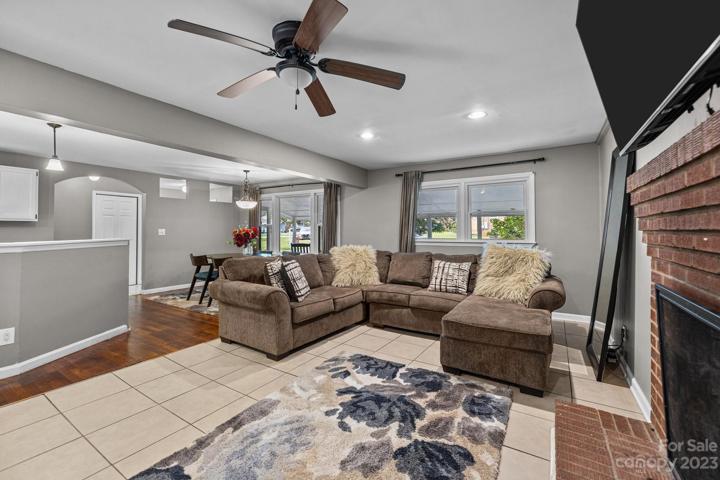 Breakfast nook and tile floor separates large living room. All the space is missing is you.