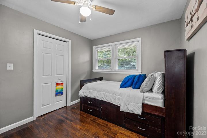Large second bedroom with scenic views. Relax while the ceiling fan circulates air to keep of your room comfortable and to help you save on your energy bill.