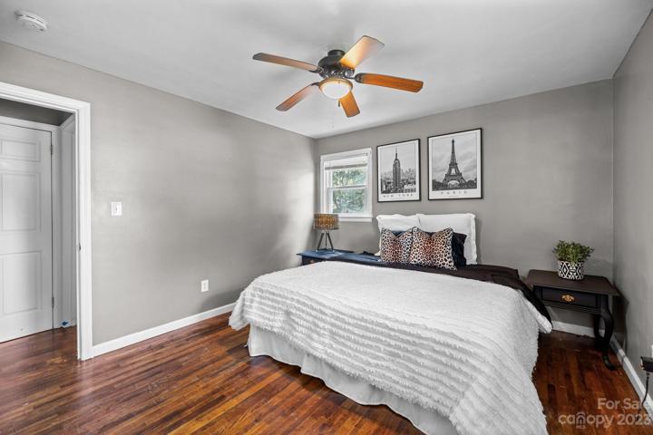 Spacious owners suite with ceiling fan and generous double door closet.