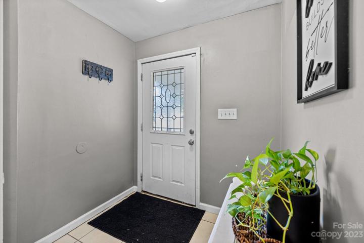 Foyer or drop zone. Bring a sense of order  with this new design trend. The two hall closets and a large laundry room spell convenience.