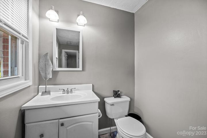 Owner suite bathroom. If you prioritize great lighting, stylish seating, and practical storage—or just stop here for inspiration.