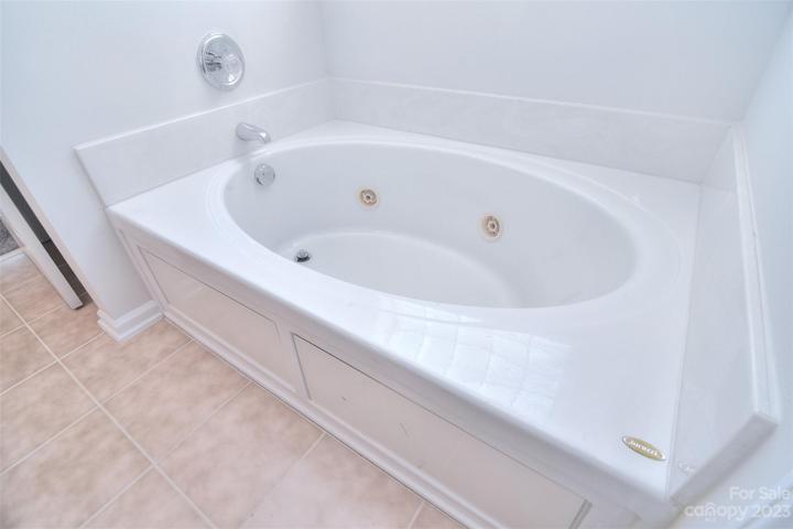 Jacuzzi tub is a luxurious haven, designed to provide the ultimate relaxation experience.