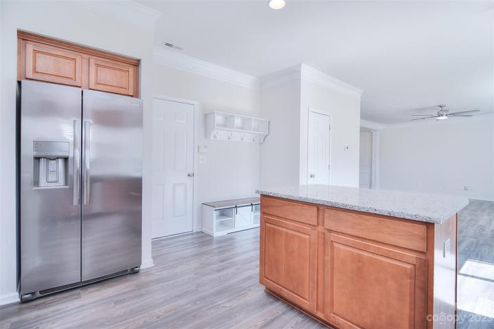 A sleek granite countertop provides a durable and stylish workspace.