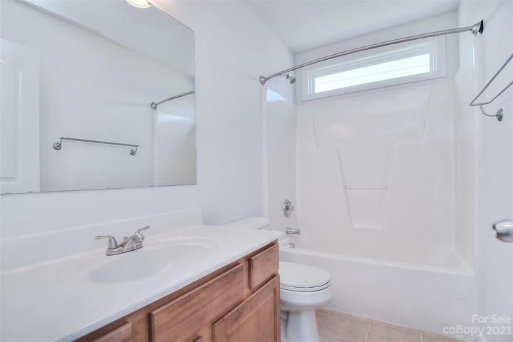 The second bathroom is located in the hallway for convenience.