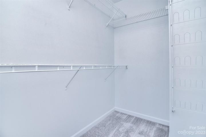 Primary bedroom includes ensuite and walk-in closet.