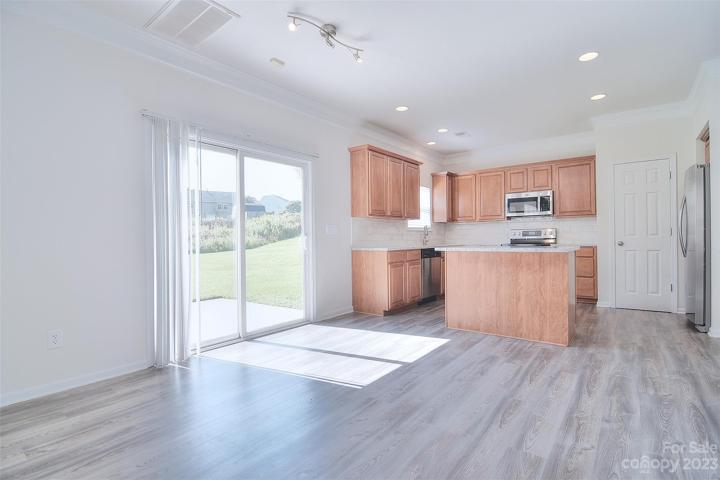 This inviting dinette area bathes in natural light during the day to make your dining experiences truly enjoyable.