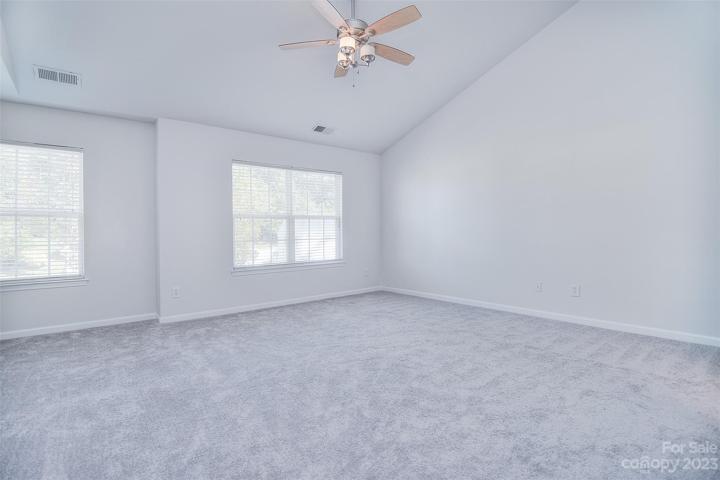 Enter into the primary bedroom - your own private oasis.