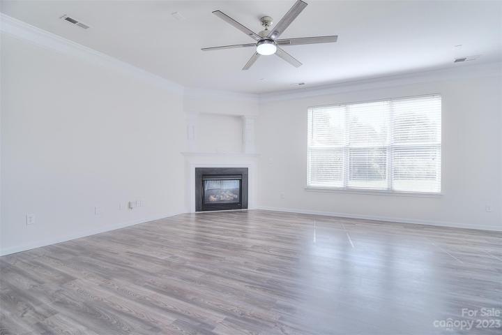 The large windows in the great room allow amplenatural light to shine through.