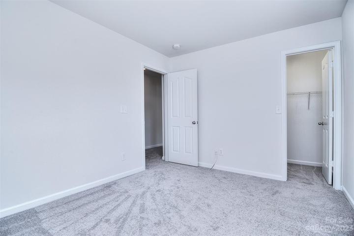 The third bedroom also includes a walk-in closet.
