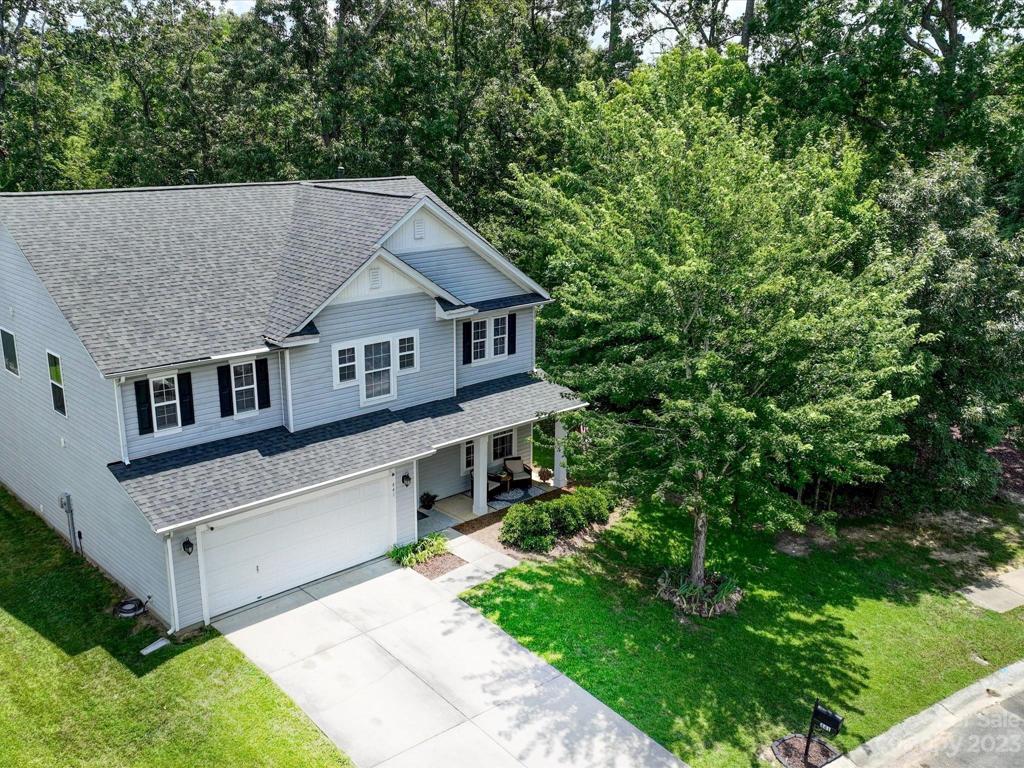 Notice all the trees surrounding this lovely home!