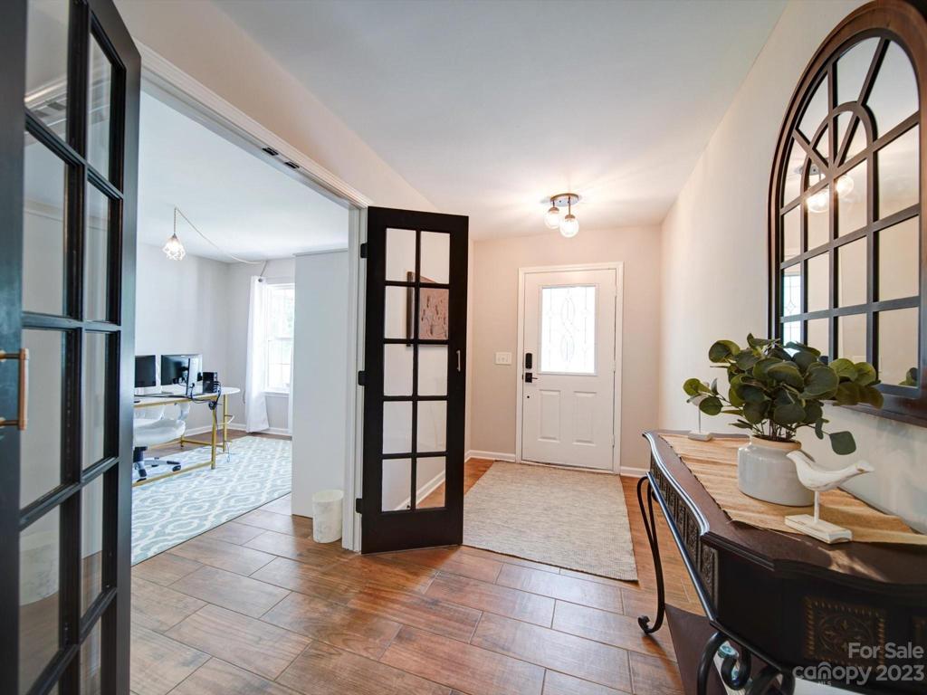 Lovely French doors accent the home office, located just off the spacious front hallway!