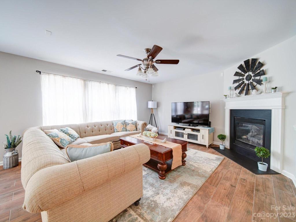Great room boasts a gas log fireplace for cozy nights!