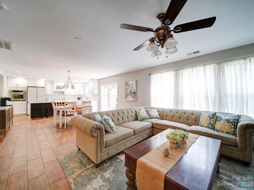 Rear of home is abundantly flooded with natural light and open spaces to enjoy friends and family!