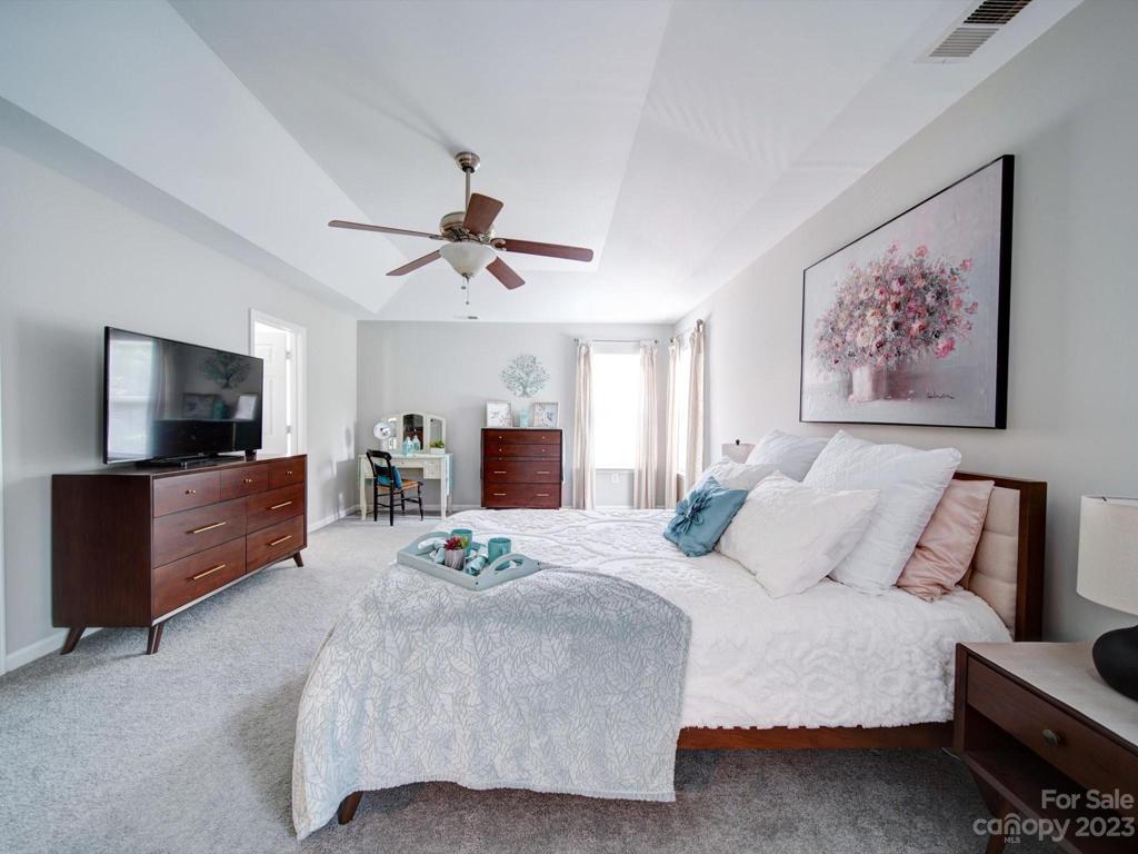 Primary bedroom is oversized with a great walk in closet for your dreamy storage needs