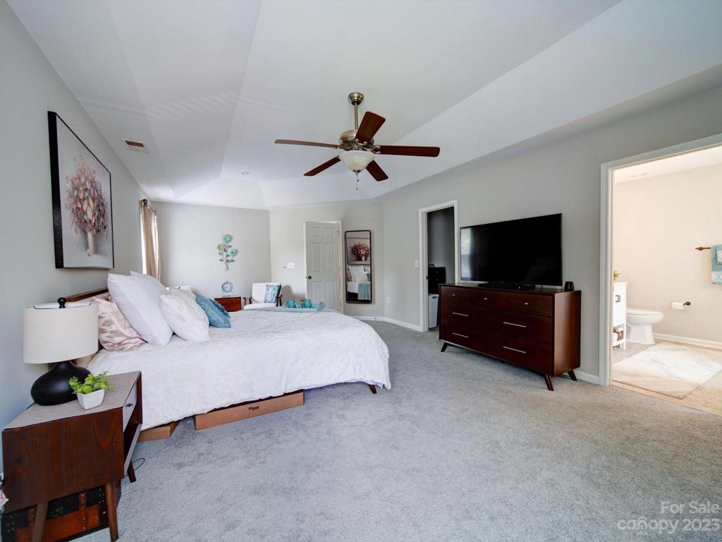 View of primary suite with ensuite bathroom