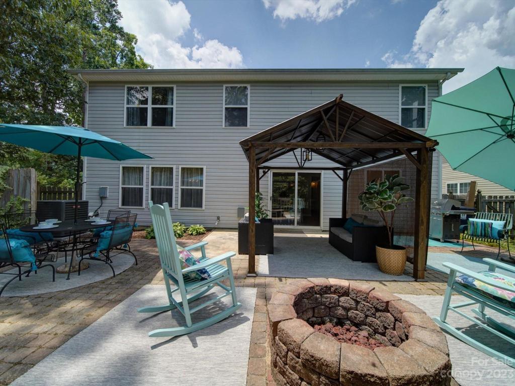 There are grilling spaces, a built in firepit, dining spaces and privacy!