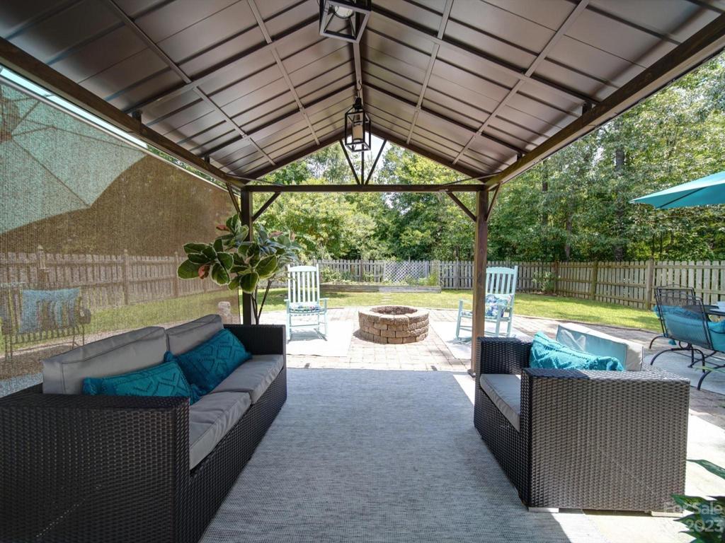Gazebo may be included with acceptable offer and here is pictured with a privacy blind to the left!