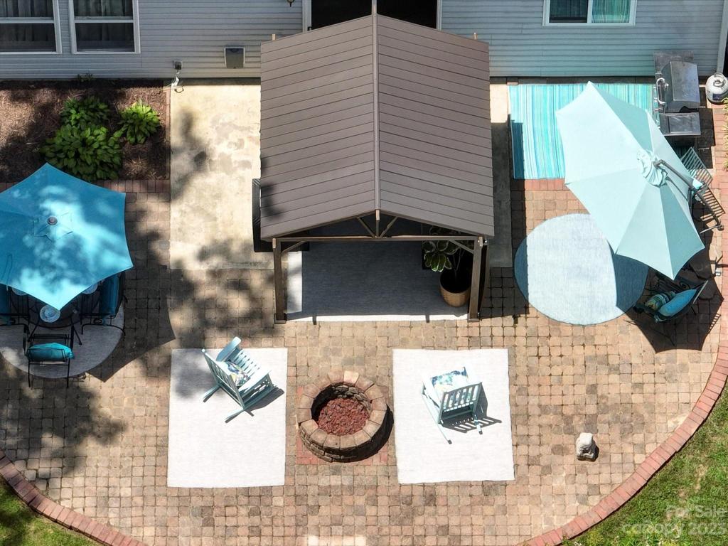 Drone image over the expansive rear patio area!