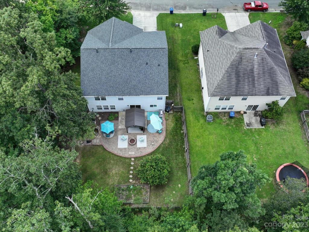 This premium lot is located just next to the corner common area, extending the barrier of privacy and peace on your rear patio!