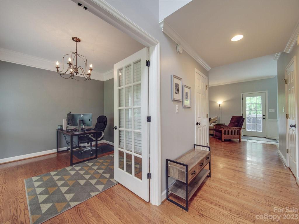 View from front door of office and hallway to the Living Room