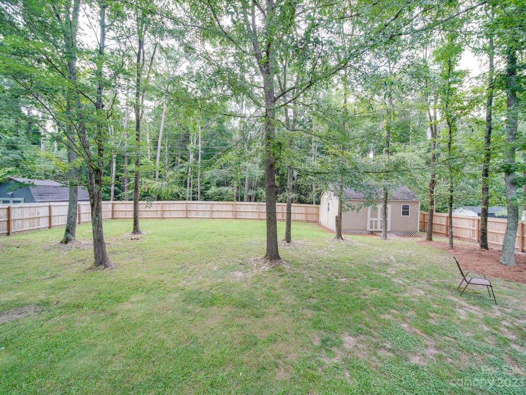 Fully Fenced Backyard with Storage Shed