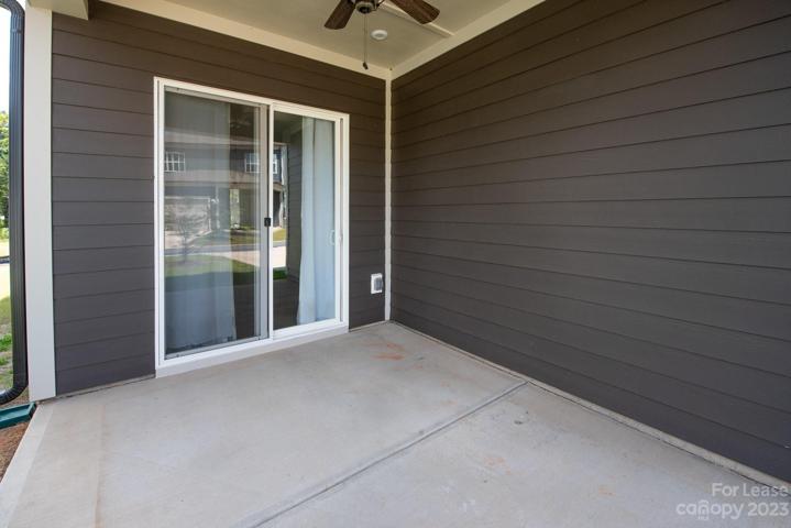Cozy covered rear porch off dining room!