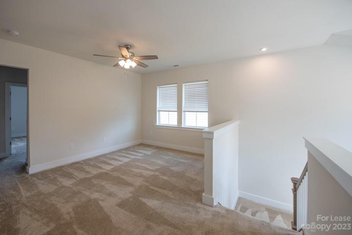 Spacious loft upstairs separates the bedrooms