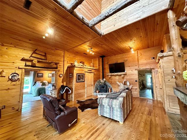 Living room with stand alone wood burning stove.