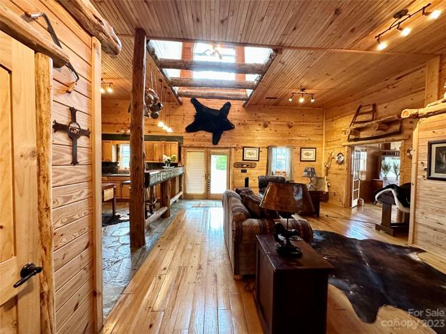 Living room features a 24 ' Foyer, 12 Foot Ceilings, wood floors