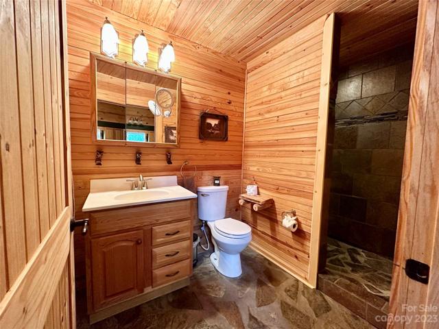 Secondary bathroom with walk-in shower.