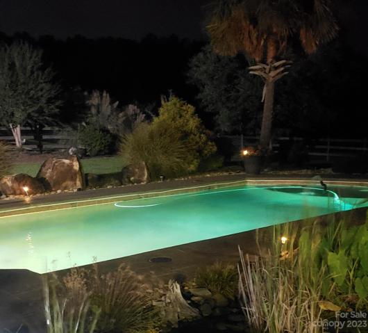 Pool is lit up at night for those late night swims.