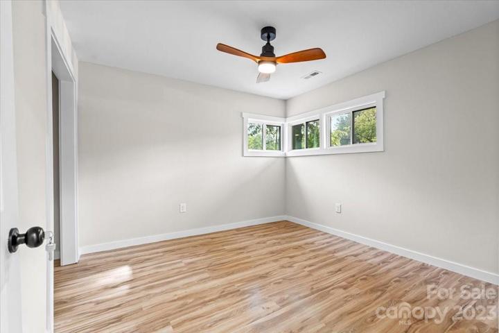 Oversized bedroom 1 with a modern ceiling fan!
