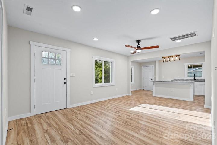 As you step into your home you are greeted by the perfect open-living concept!