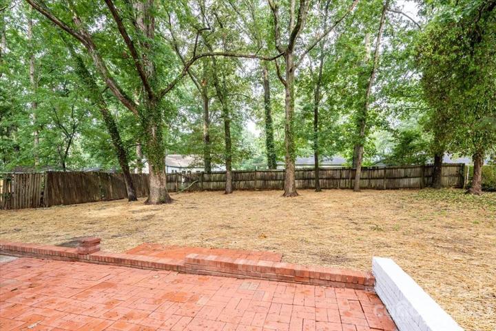 Privacy, peace, and quiet in your partially fenced oversized backyard!