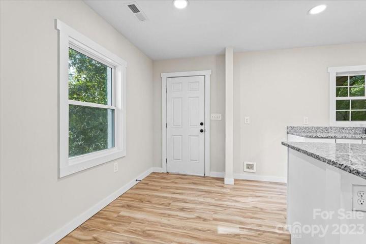 Side entry door from your covered front porch!