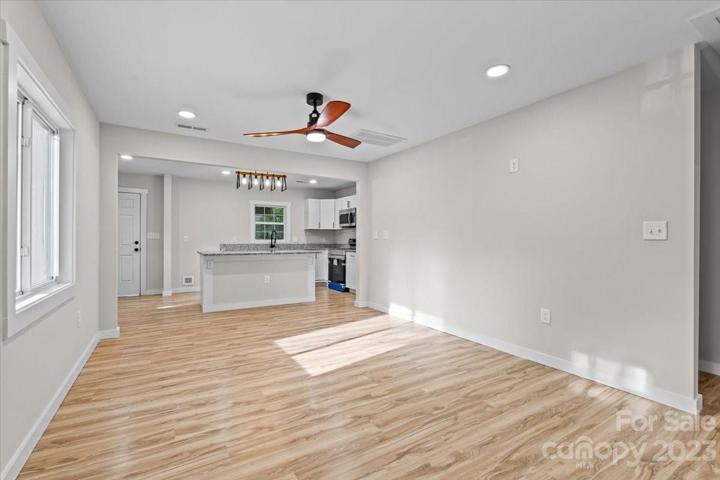Your living room flows into your stunning kitchen!