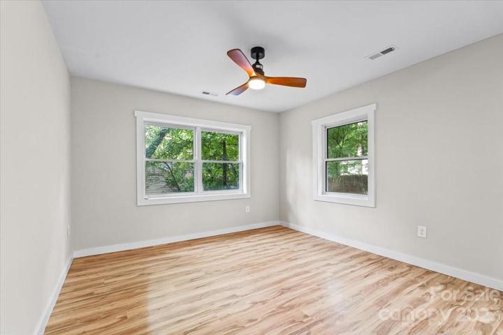 Oversized bedroom 2 with a modern ceiling fan!