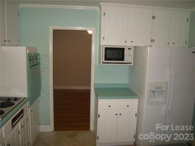 Kitchen view into Dining Room.