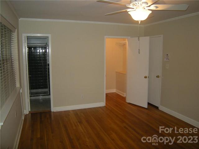Master Bedroom view into walk-in closet and Master Bath.