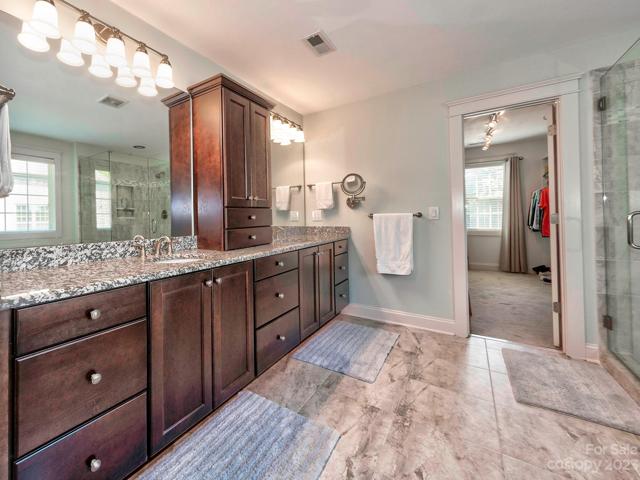 Master Bathroom with Built-ins and Under cabinet lighting