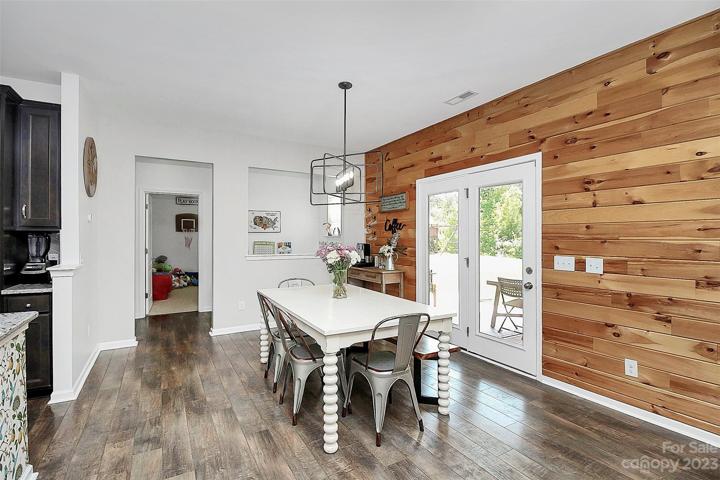 Kitchen & dining space opens to patio.