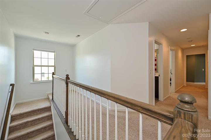 High ceilings continue upstairs.