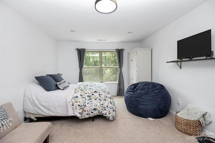 2nd level bedroom offers plenty of space for kids or guests.