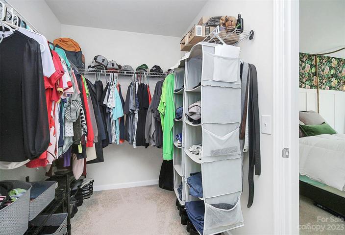 Huge primary closet!  Even more space than photographed.