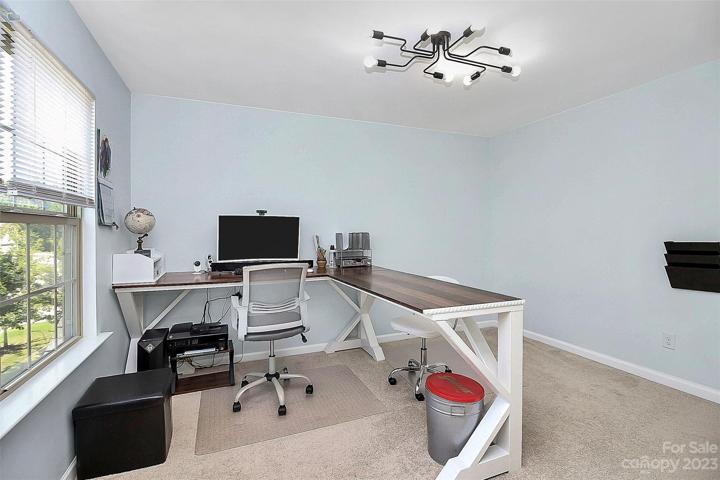 Bedroom 2 upstairs, currently being used as office.