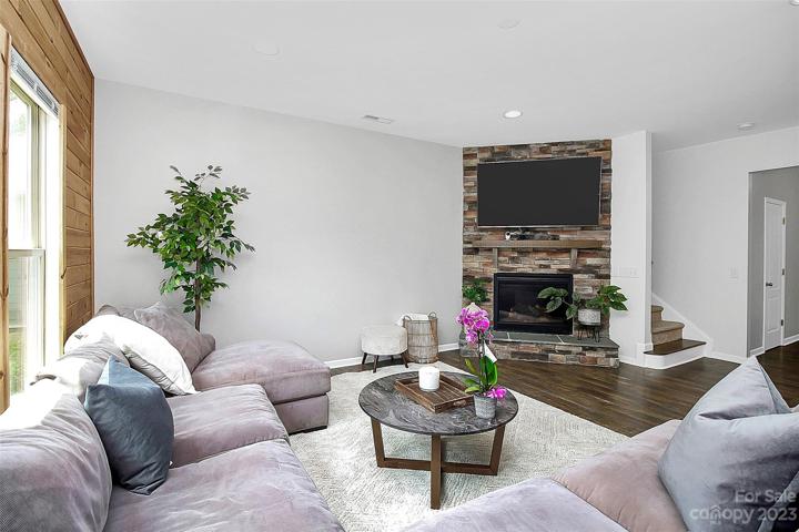 Stacked stone gas fireplace is perfect for upcoming fall nights.