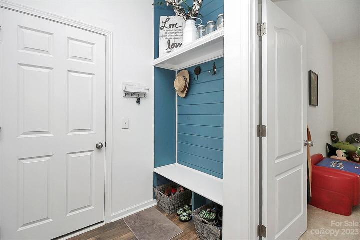 Drop those backpacks or work bags, kick off those shoes. Oversized 2 car garage has epoxy floor for easy clean up.