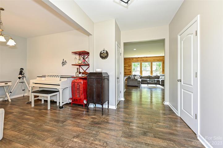 Spacious entry w/ 4.5" LVP throughout main.