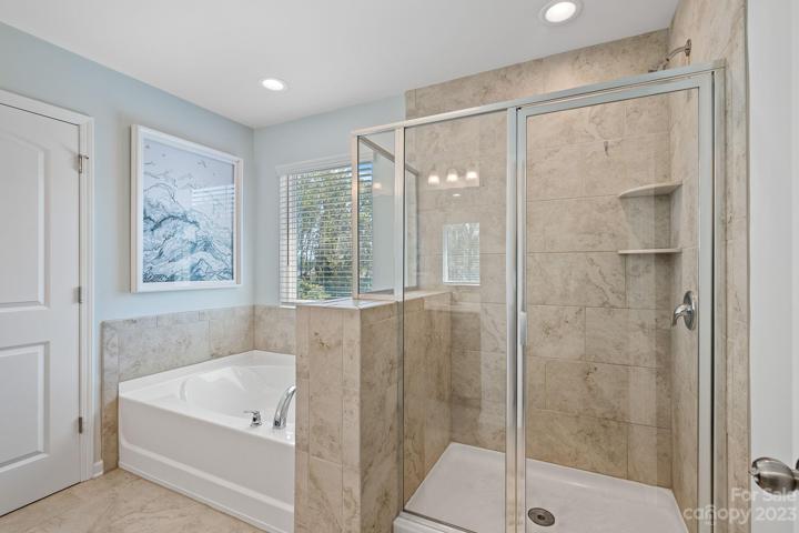 Primary bath with separate tub and shower